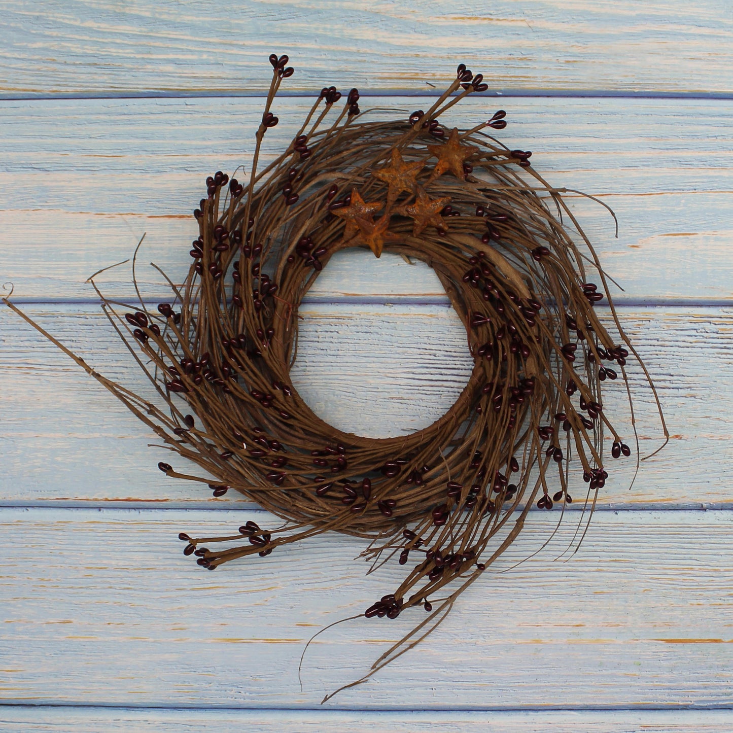CVHOMEDECO. Primitives Rustic Pip Berries and Twig with Rusty Barn Stars Wreath, 10 Inch, Burgundy