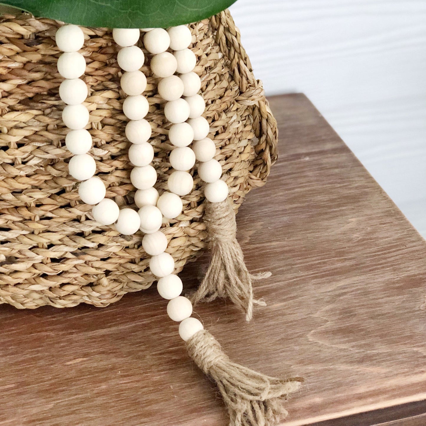 CVHOMEDECO. Wood Beads Garland with Tassels Farmhouse Rustic Wooden Prayer Bead String Wall Hanging Accent for Home Festival Decor. Natural