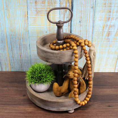 CVHOMEDECO. Wood Grain Beads Garland with Tassels Farmhouse Rustic Wooden Prayer Bead String Wall Hanging Accent for Home Festival Decor. Brown