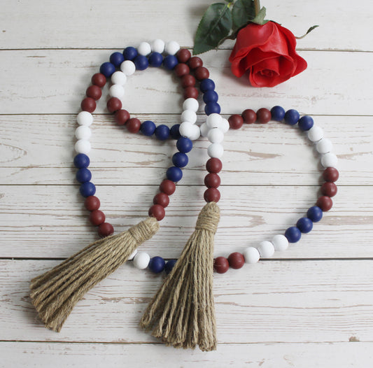 CVHOMEDECO. Wood Beads Garland with Tassels Farmhouse Rustic Wooden Prayer Bead String Wall Hanging Accent for Home Festival Decor. Mix