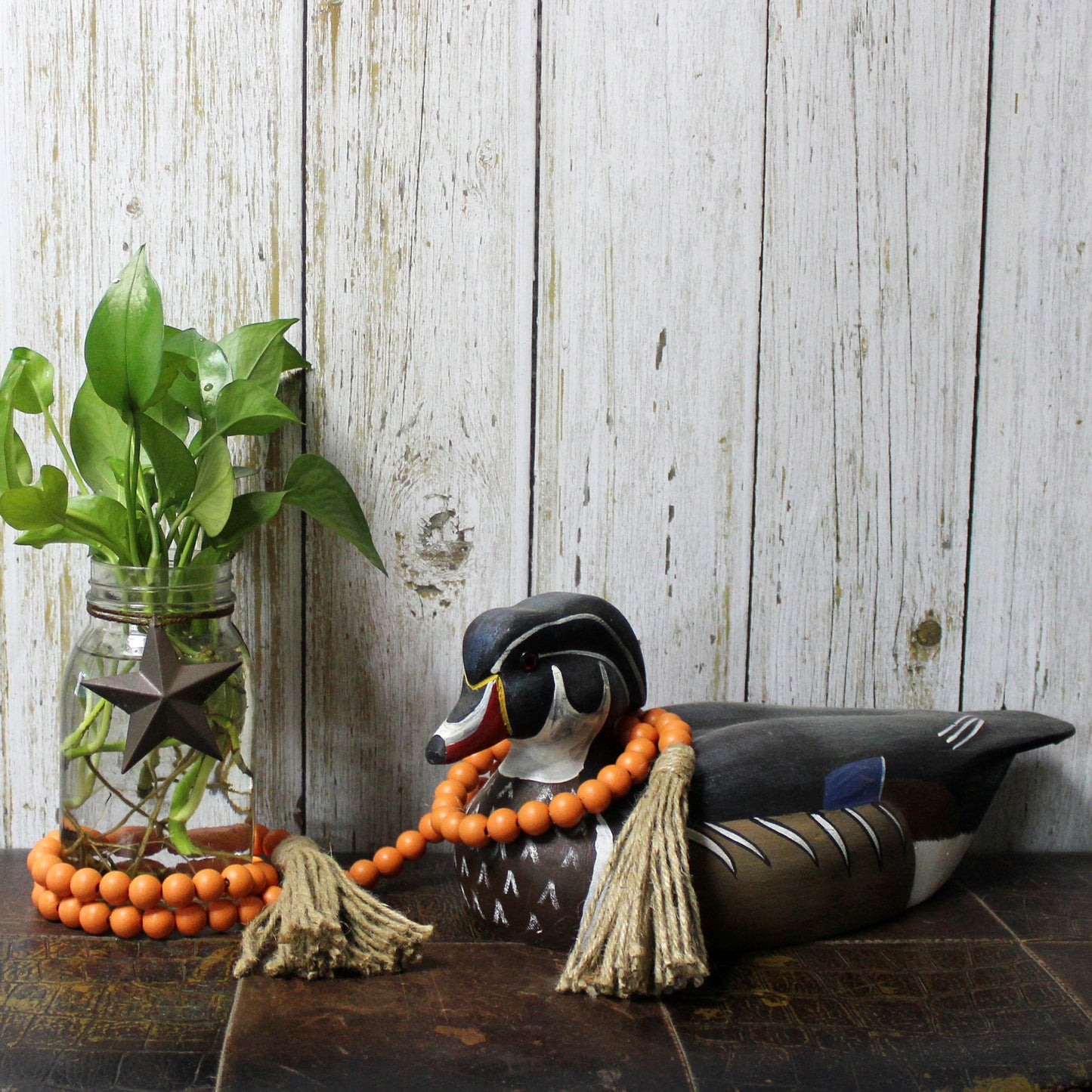CVHOMEDECO. Wood Beads Garland with Tassels Farmhouse Rustic Wooden Prayer Bead String Wall Hanging Accent for Home Festival Decor. Orange