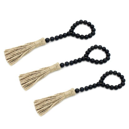 CVHOMEDECO. Wood Beads Garland with Tassels 3 PCS Farmhouse Rustic Wooden Prayer Bead String Wall Hanging Accent for Home Festival Decor. Black