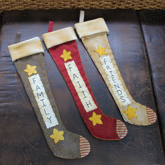 CVHOMEDECO. Primitive Rustic 18 Inch Hanging Stockings with Stitched Messages Friends Faith Family for Christmas or Home Décor. 3 Assorted