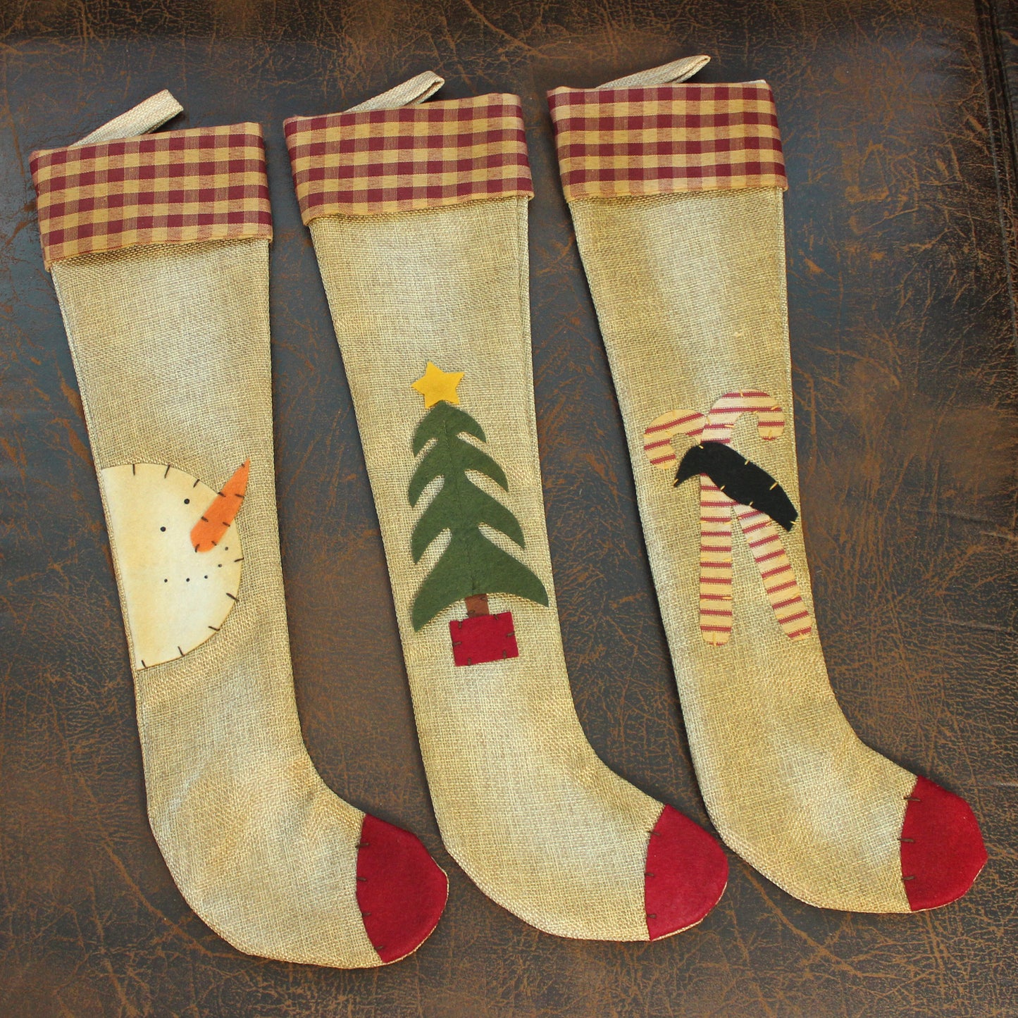 CVHOMEDECO. Primitives Rustic Design 18 Inch Christmas Tree Hanging Stockings Vintage Snowman, Tree, Crow and Candy Cane Xmas Hanging Decoration Gifts, 3 Assorted