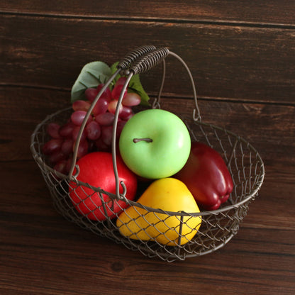 CVHOMEDECO. Oval Metal Wire Egg Basket Wire Fruit Basket with Handle Primitives Vintage Style Storage Basket. Rusty, 11 X 7.25 X 3.5 Inch