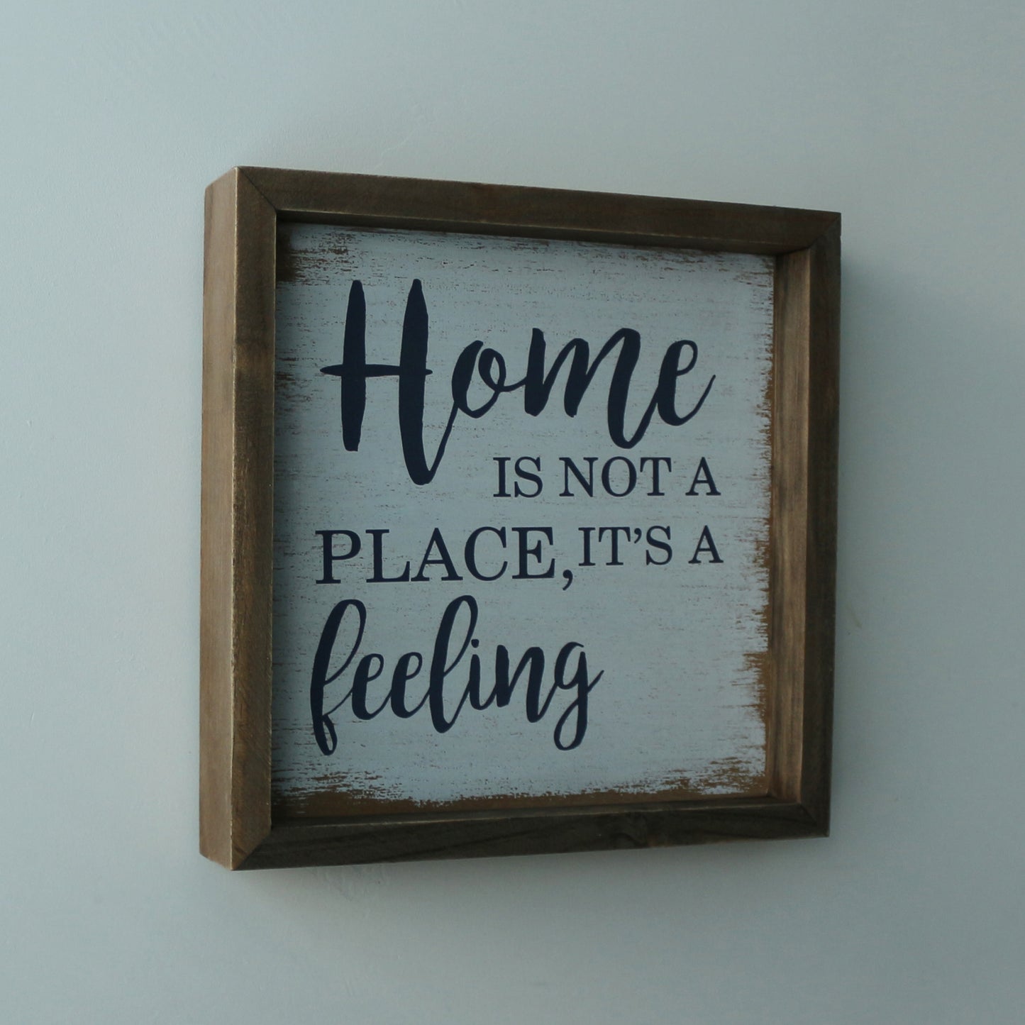 CVHOMEDECO. Rustic Distressed "Home is not a place, it’s a feeling" Shadow Box Frame Wall Mounted Hanging Decor Art, 9.75 x 9.75 Inch