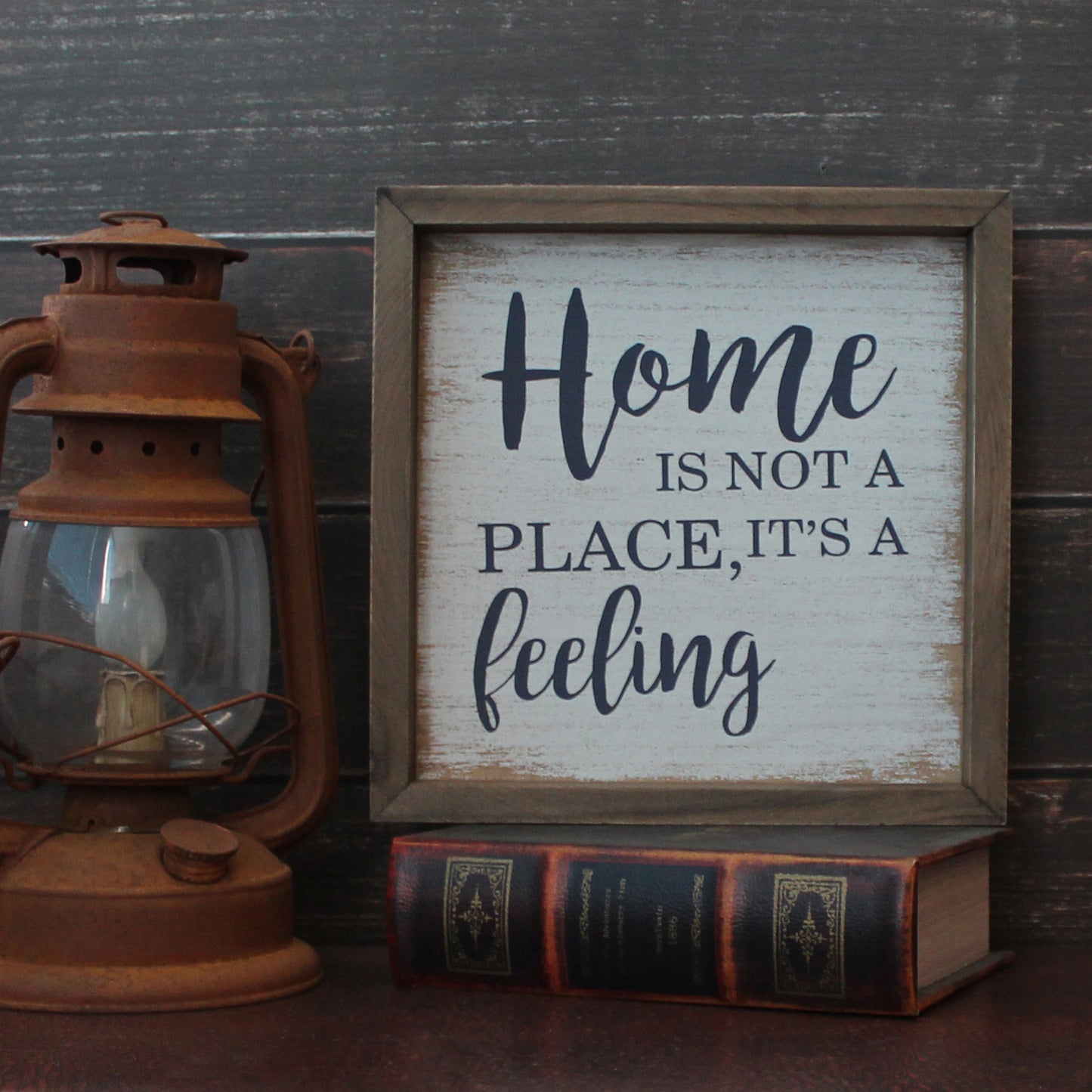 CVHOMEDECO. Rustic Distressed "Home is not a place, it’s a feeling" Shadow Box Frame Wall Mounted Hanging Decor Art, 9.75 x 9.75 Inch